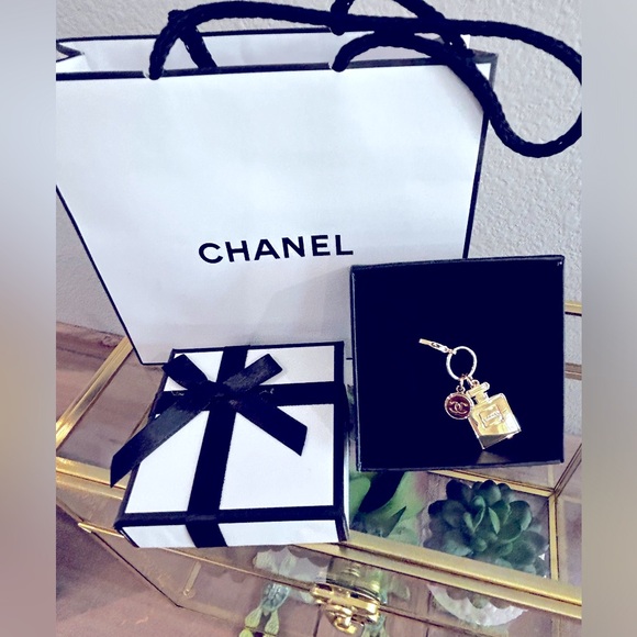 CHANEL Accessories - Chanel Beauty Charm w/box & bag.